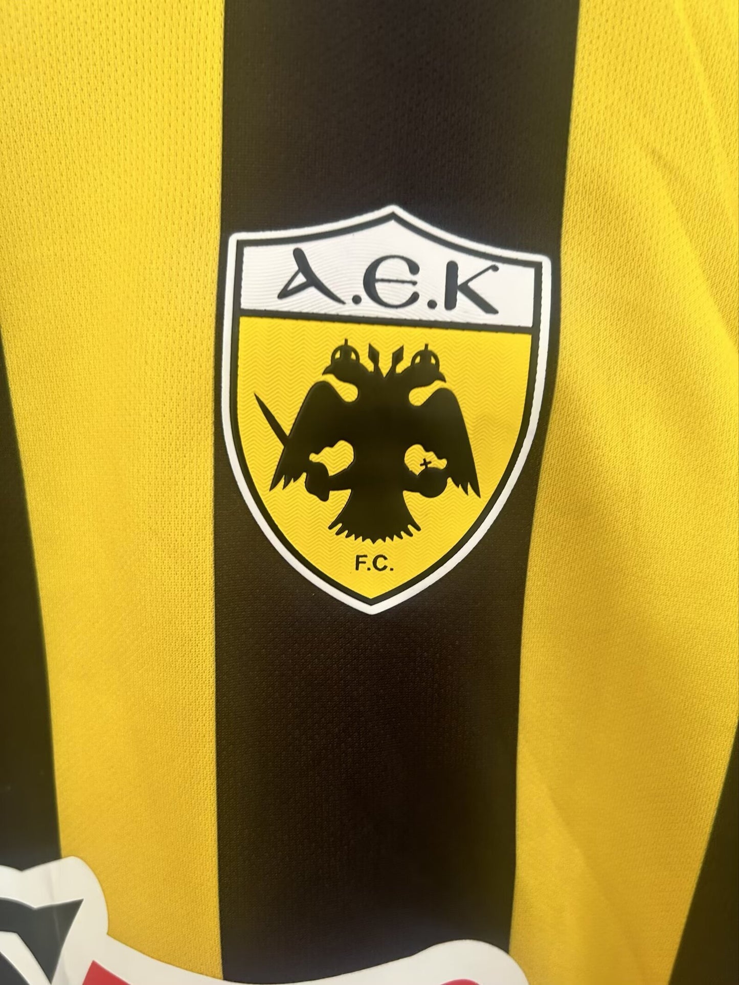 AEK FC home shirt 25/26