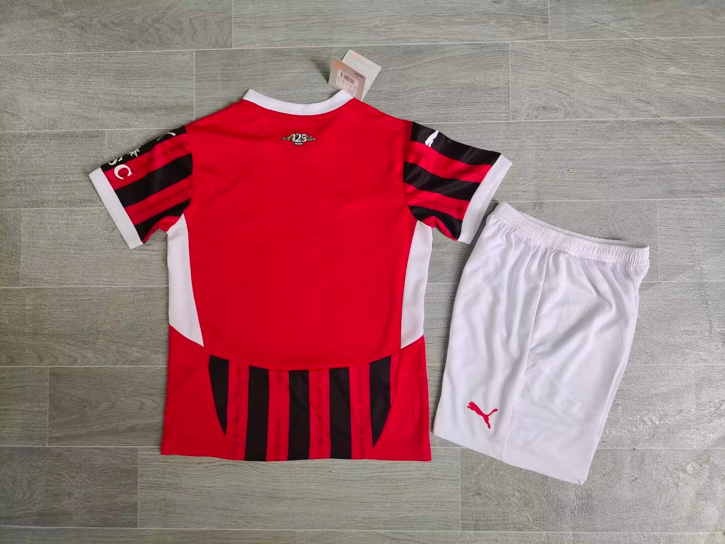 Milan kids home shirt 24/25